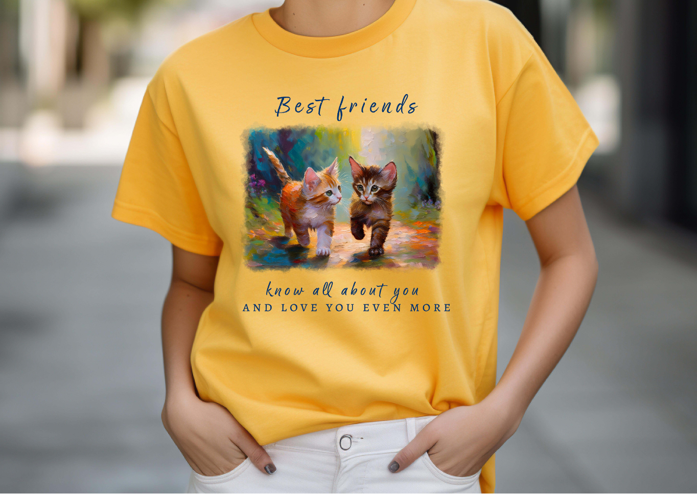 Woman wearing a yellow t-shirt with a cat graphic and text.
